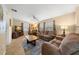 Spacious living room with comfortable seating, neutral walls, and bright natural light at 1542 Picardy Cir, Clearwater, FL 33755
