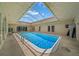 Enjoy this private screened-in pool, perfect for swimming laps at 1542 Picardy Cir, Clearwater, FL 33755