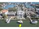 Beautiful waterfront home featuring a private boat dock, pool, and stunning canal views from the backyard at 2829 Seabreeze S Dr, Gulfport, FL 33707