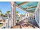 Relaxing covered patio with waterfront views, perfect for outdoor dining and entertaining at 2829 Seabreeze S Dr, Gulfport, FL 33707