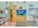 Bright living area with custom built-in aquarium and easy access to dining area at 2829 Seabreeze S Dr, Gulfport, FL 33707