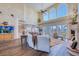 Spacious living room with fireplace, aquarium and easy access to dining area and patio at 2829 Seabreeze S Dr, Gulfport, FL 33707
