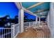 Waterfront patio offering tranquil views and a peaceful ambiance at twilight at 2829 Seabreeze S Dr, Gulfport, FL 33707