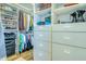A closet featuring built-in shelving and drawers for optimal storage and organization at 2829 Seabreeze S Dr, Gulfport, FL 33707