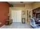 Office space with a built-in bookcase, double doors, and neutral wall color at 3056 Pepperwood W Ln, Clearwater, FL 33761