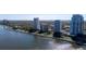 Scenic aerial view of waterfront condos, featuring lush landscaping and a beautiful bay at 3435 Bayshore Blvd # 1401S, Tampa, FL 33629