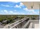 Open balcony showcasing expansive views of the surrounding neighborhood and clear blue skies at 3435 Bayshore Blvd # 1401S, Tampa, FL 33629