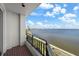 Breathtaking water views from a private balcony, showcasing the scenic coastline and clear blue skies at 3435 Bayshore Blvd # 1401S, Tampa, FL 33629
