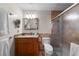 Bathroom featuring a glass-enclosed shower, vanity with granite countertops, and modern fixtures at 3435 Bayshore Blvd # 1401S, Tampa, FL 33629