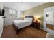 Comfortable bedroom with a queen bed, neutral walls, and natural light at 3435 Bayshore Blvd # 1401S, Tampa, FL 33629