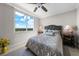 Bedroom featuring a large window that offers views of beautiful blue skies at 3435 Bayshore Blvd # 1401S, Tampa, FL 33629