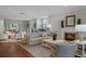 Inviting common room showcases a comfortable seating arrangement, fireplace, dining area, and seamless blend of elegance at 3435 Bayshore Blvd # 1401S, Tampa, FL 33629