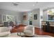 Relaxing common room offers comfortable seating, tasteful decor, and access to an outdoor seating area with picturesque views at 3435 Bayshore Blvd # 1401S, Tampa, FL 33629