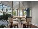 Quaint dining area near expansive windows offers tranquil views of the surrounding scenery and seating for four at 3435 Bayshore Blvd # 1401S, Tampa, FL 33629