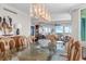 Formal dining room showcases decorative table with glass doors and water view at 3435 Bayshore Blvd # 1401S, Tampa, FL 33629