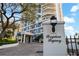 Bayshore Regency entrance with well-manicured landscaping and elegant architecture showcasing a luxurious, welcoming facade at 3435 Bayshore Blvd # 1401S, Tampa, FL 33629