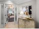 Inviting foyer leading to a spacious living area with elegant chandelier and stunning water views, enhanced by art at 3435 Bayshore Blvd # 1401S, Tampa, FL 33629