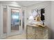 Elegant foyer featuring custom glass door, travertine flooring, and stylish accents; ideal for making a lasting first impression at 3435 Bayshore Blvd # 1401S, Tampa, FL 33629