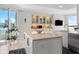 Bright kitchen with granite island and built-in bar area, great for entertaining at 3435 Bayshore Blvd # 1401S, Tampa, FL 33629