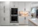 Built-in stainless ovens and white cabinets add convenience and storage at 3435 Bayshore Blvd # 1401S, Tampa, FL 33629