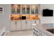 Beautiful display cabinet lighting adds architectural detail to this area of the kitchen at 3435 Bayshore Blvd # 1401S, Tampa, FL 33629