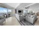 Well-lit living room with comfortable seating and fireplace at 3435 Bayshore Blvd # 1401S, Tampa, FL 33629