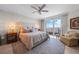 Cozy main bedroom featuring a luxurious bed, elegant furnishings, and stunning water views at 3435 Bayshore Blvd # 1401S, Tampa, FL 33629
