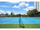 Well-maintained tennis court in a residential area, perfect for recreational play and exercise at 3435 Bayshore Blvd # 1401S, Tampa, FL 33629