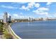 Waterfront view with coastal road, showing the coastline and buildings at 3435 Bayshore Blvd # 1401S, Tampa, FL 33629
