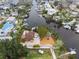 Aerial view of a waterfront property with a boat lift and easy access to waterways at 378 Tennessee Ave, Crystal Beach, FL 34681