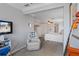 Open bedroom layout featuring a recliner, television and access to the sleeping quarters at 378 Tennessee Ave, Crystal Beach, FL 34681