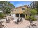 Rear patio with ample seating and a well-maintained lawn provides a relaxing outdoor space at 378 Tennessee Ave, Crystal Beach, FL 34681