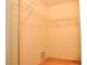 A walk-in closet features ample shelving space for organized storage at 3876 Darston St, Palm Harbor, FL 34685
