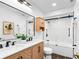Updated bathroom features double vanity, tile floors, and a shower/tub combo at 408 S Arrawana Ave # B4, Tampa, FL 33609