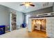 Stylish bedroom with a loft bed, built-in storage, and a decorative ceiling at 4250 Warwick Hills Dr, Wesley Chapel, FL 33543