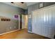 Bedroom featuring closet, carpeted floors, decorative wall accents, and a bright interior at 4250 Warwick Hills Dr, Wesley Chapel, FL 33543
