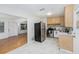 Charming kitchen featuring stainless steel appliances, light wood cabinets, and modern countertops at 4846 Highland S St, St Petersburg, FL 33705