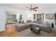 Comfortable living room with large sectional sofa, bay window, and natural light at 4846 Highland S St, St Petersburg, FL 33705