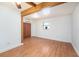 Bright living room with wood-look flooring, ceiling fan, and large closet for ample storage at 4846 Highland S St, St Petersburg, FL 33705