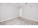 Empty bedroom featuring neutral carpet, ceiling fan, and bright walls at 5502 Liberty Plain Cir, Tampa, FL 33611