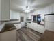 Bright kitchen with white cabinets, dark countertops, and modern appliances at 6166 9Th N Ave, St Petersburg, FL 33710