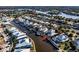 Aerial view of waterfront homes with private docks along a canal community at 625 Mirabay Blvd, Apollo Beach, FL 33572
