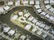 Aerial view of waterfront homes, highlighting community's canal access, boat docks, and premium real estate location at 625 Mirabay Blvd, Apollo Beach, FL 33572