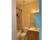 Bathroom featuring a sink vanity, toilet, and tiled shower and tub combination at 625 Mirabay Blvd, Apollo Beach, FL 33572