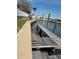 Wooden dock on the water providing access to the waterfront and boating opportunities at 625 Mirabay Blvd, Apollo Beach, FL 33572
