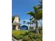 Beautiful entrance sign for MiraBay, surrounded by lush tropical plants and palms at 625 Mirabay Blvd, Apollo Beach, FL 33572