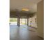 Spacious two-car garage featuring an electric car charger and ample storage space at 625 Mirabay Blvd, Apollo Beach, FL 33572