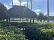 Secluded gazebo surrounded by greenery, offering a peaceful spot for relaxation and enjoying nature in the community at 625 Mirabay Blvd, Apollo Beach, FL 33572