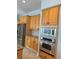 Bright kitchen features stainless steel appliances, including a built-in microwave and oven at 625 Mirabay Blvd, Apollo Beach, FL 33572