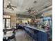 Well-lit restaurant space with a long bar and tables, perfect for casual dining and socializing within the community at 625 Mirabay Blvd, Apollo Beach, FL 33572